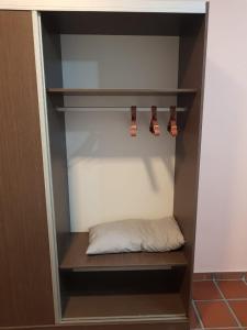 a closet with a pillow and lights in it at Casa San Román in La Rioja