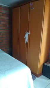 Cama ou camas em um quarto em Casa simples Serra gaúcha