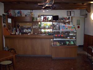 Lounge nebo bar v ubytování Albergo Ristorante Gualtieri