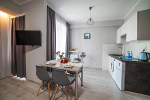 Kuchyňa alebo kuchynka v ubytovaní STOP Apartment