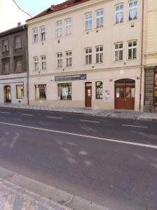 a building on the side of a street at Studio Husitská 114/74 in Prague