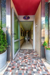 an entrance to an office building with a hallway at Hotel Trakart Residence in Plovdiv