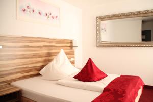 Postel nebo postele na pokoji v ubytování Hotel Bruckertshof