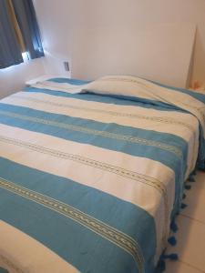 Una cama o camas en una habitación de La mejor ubicación. A unas cuadras del centro
