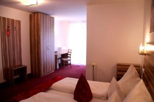 Postel nebo postele na pokoji v ubytování Hotel Bruckertshof