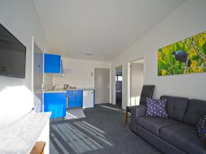 Svetainės erdvė apgyvendinimo įstaigoje Hokitika's Kiwi Holiday Park and Motels