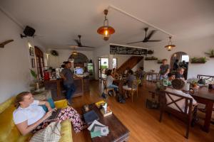 a group of people sitting in a living room at Srilax in Colombo
