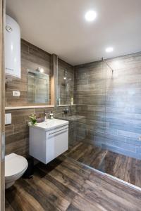 Kúpeľňa v ubytovaní Apinelo Port Rooms