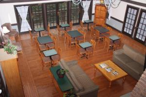 an overhead view of a restaurant with tables and chairs at Spring House Inn in Porter