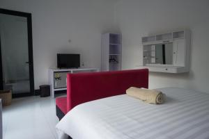 Postel nebo postele na pokoji v ubytování Vande Guest House