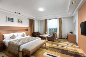 Voodi või voodid majutusasutuse Best Western Green Hill Hotel toas +37 fotot