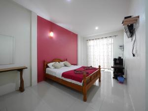 Voodi või voodid majutusasutuse Ban FahSai Guest House toas