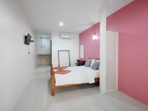Кровать или кровати в номере Ban FahSai Guest House