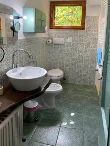 Koupelna v ubytování B&B La Baita