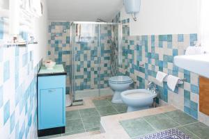 Koupelna v ubytování B&B La Baita