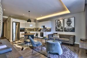 Et opholdsområde på Chelsea Luxury Suites by Totalstay