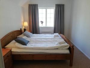 Llit o llits en una habitació de EFS Höllviksstrand