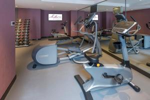 a gym with cardio equipment in a room at Silka Tsuen Wan, Hong Kong in Hong Kong