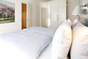 Letto o letti in una camera di Maximilians Domizil Edenkoben
