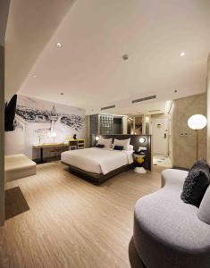 Letto o letti in una camera di YELLO Hotel Harmoni