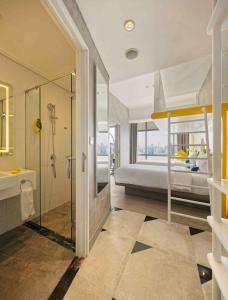 Letto o letti in una camera di YELLO Hotel Harmoni