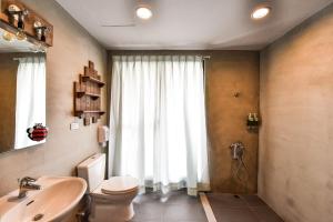 Un baño de Anping Wikid Design Hotel