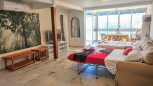 En eller flere senge i et værelse på Apartamentos Halcón