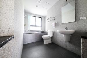 Un baño de Anping Wikid Design Hotel