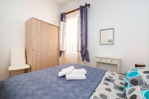 Posteľ alebo postele v izbe v ubytovaní History Apartments Center