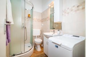 Kúpeľňa v ubytovaní History Apartments Center + 37 fotografií