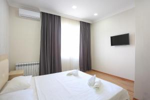 Letto o letti in una camera di Hotel Botanica
