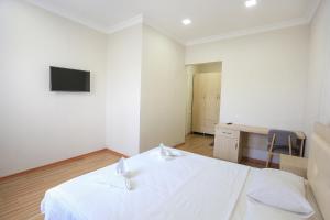 TV o dispositivi per l'intrattenimento presso Hotel Botanica
