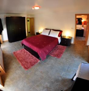 A bed or beds in a room at Casa dos Hospitalarios