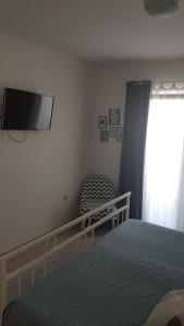 Posteľ alebo postele v izbe v ubytovaní Apartment Luna