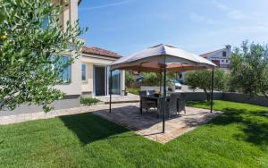 Vonkajšia záhrada v ubytovaní Apartment Natalija