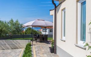 Vonkajšia záhrada v ubytovaní Apartment Natalija