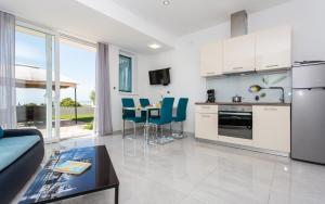 Kuchyňa alebo kuchynka v ubytovaní Apartment Natalija