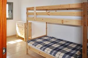 A bed or beds in a room at Casa Gabriel