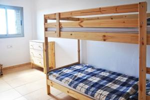 A bed or beds in a room at Casa Gabriel