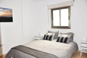 A bed or beds in a room at Casa Gabriel