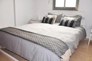 A bed or beds in a room at Casa Gabriel