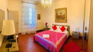 A bed or beds in a room at Villa Monica