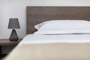 Ein Bett oder Betten in einem Zimmer der Unterkunft Airport House