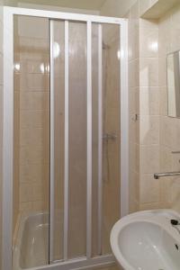 Koupelna v ubytování Hotel KAMU GARNI