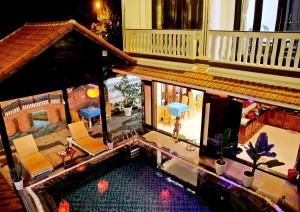 Posezení v ubytování Green Island Villa Hoi An
