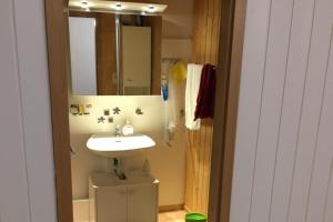 Koupelna v ubytování Apartmenthaus Gauenpark - CharmingStay