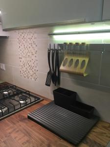A kitchen or kitchenette at New Capolinea 5 - Apartment