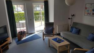 Posezení v ubytování Ferienwohnung Mueller_ 15121