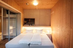 Voodi või voodid majutusasutuse Hotel Tia Smart Natur toas