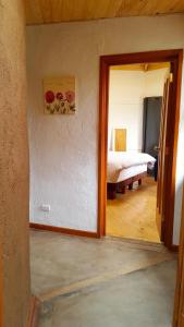Postel nebo postele na pokoji v ubytování Las Palmas Lodge